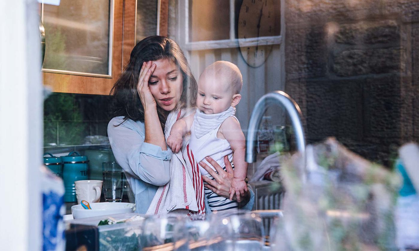 mother overwhelmed with baby