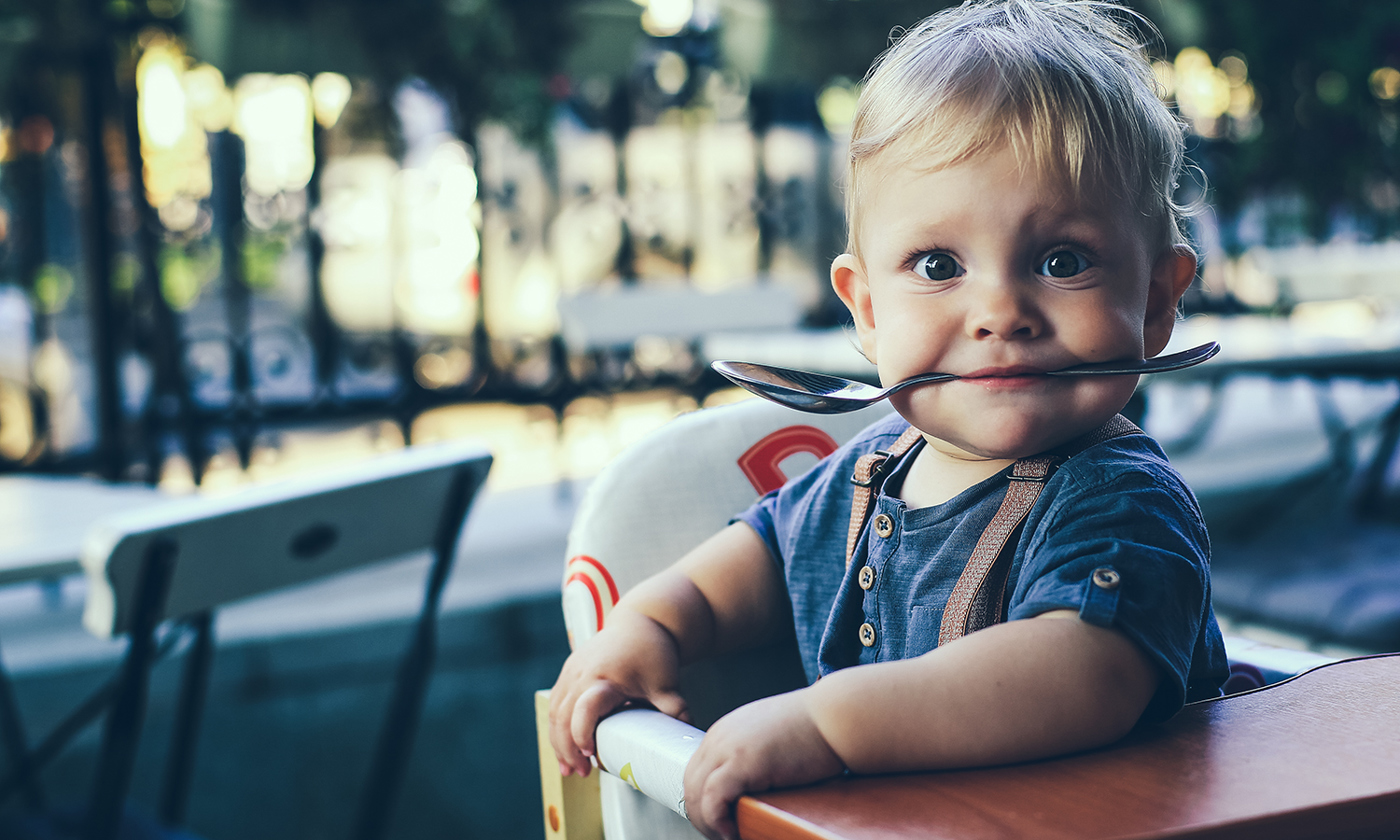 Little boy at a cafe