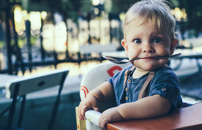 Little boy at a cafe
