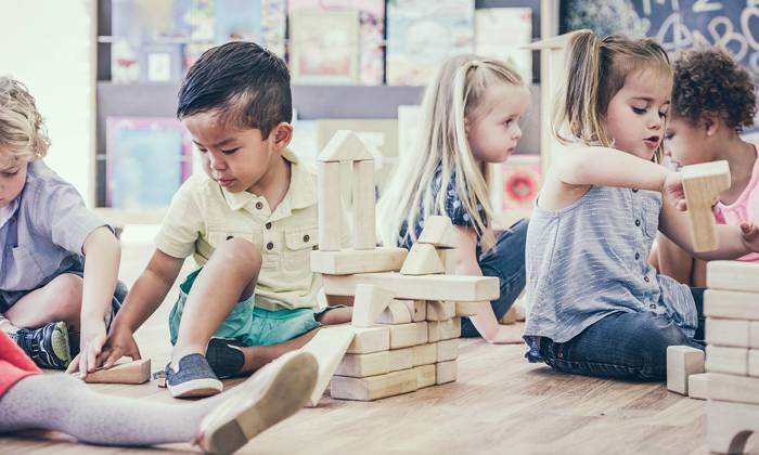 Children playing in preschool together