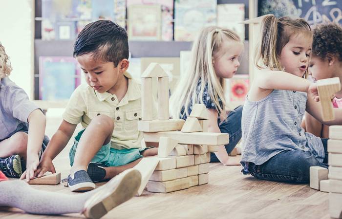 Children playing in preschool together