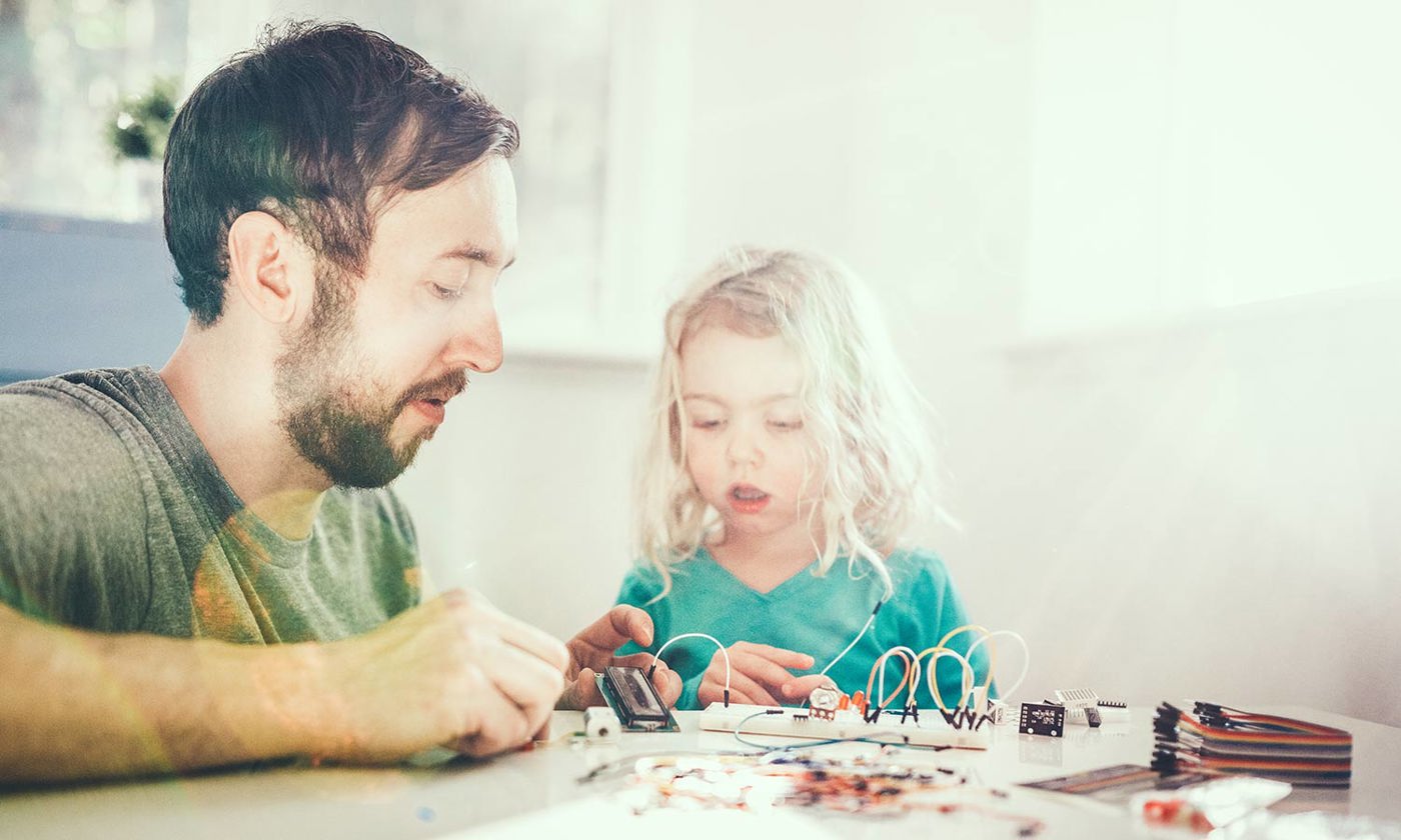 Dad Teaching Daughter electrical engineering