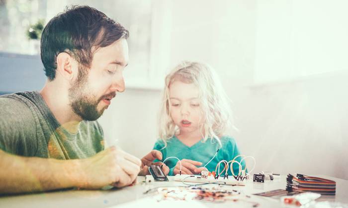 Dad Teaching Daughter electrical engineering