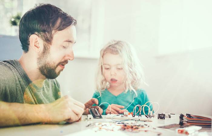 Dad Teaching Daughter electrical engineering