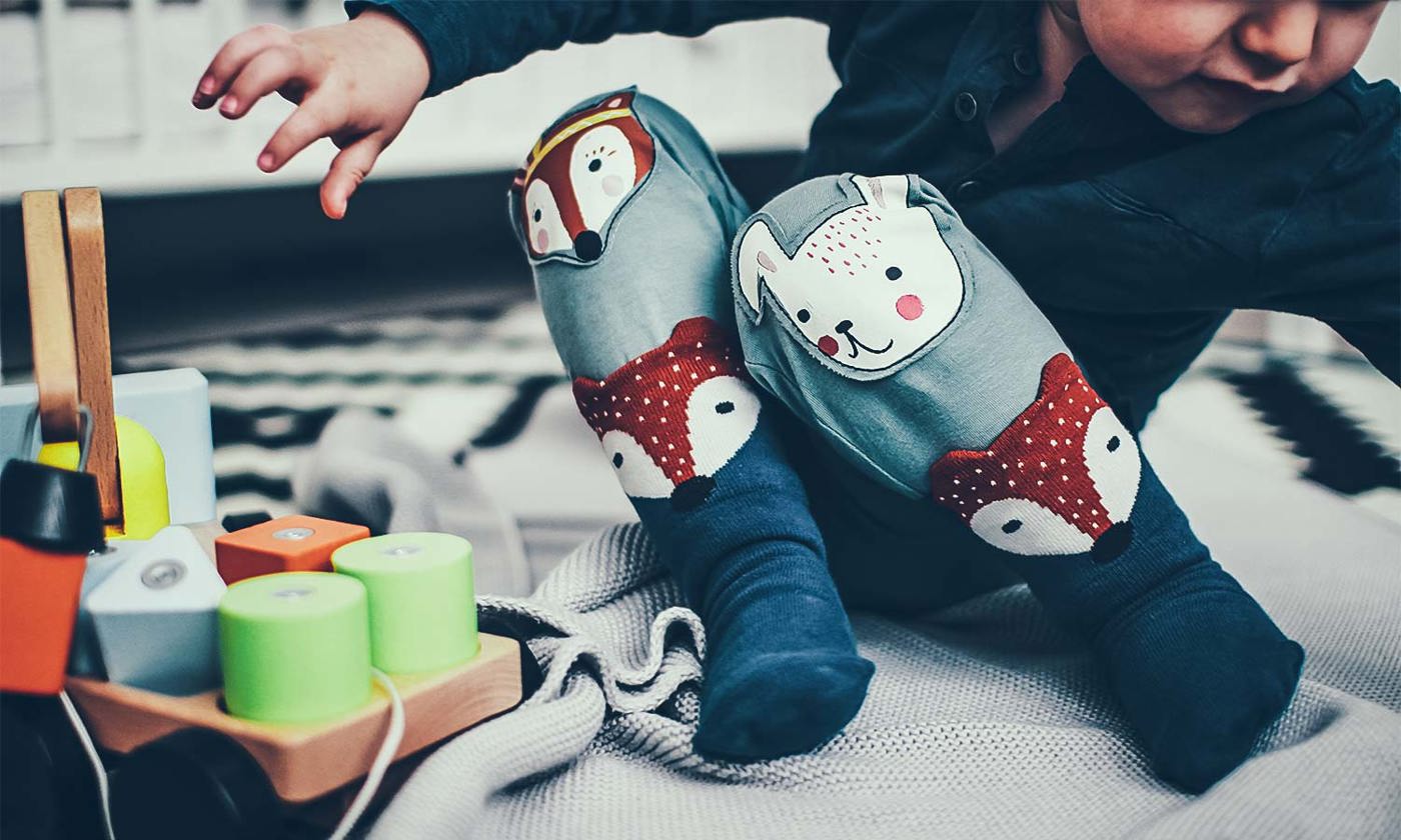 Little girl playing with blocks