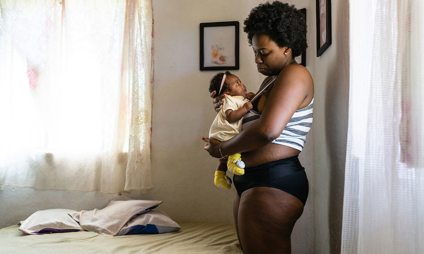 New mother holding baby