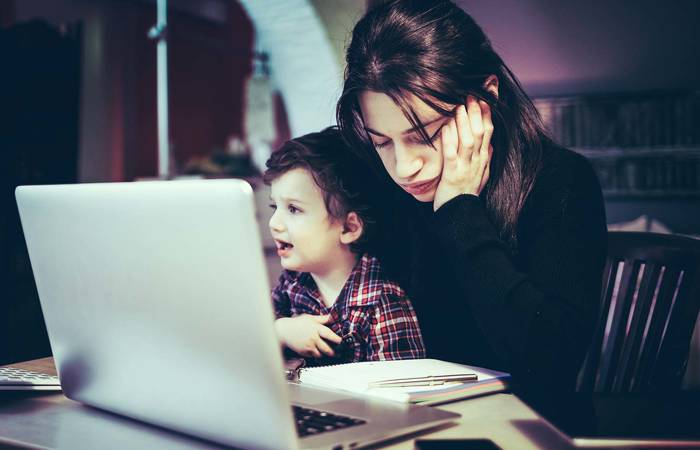 Stressed mother with little boy
