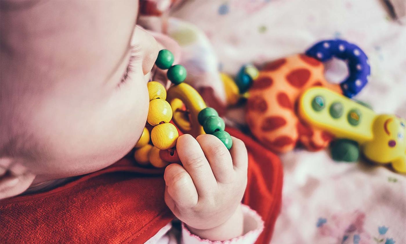 Baby and toy - First 1000 days of life