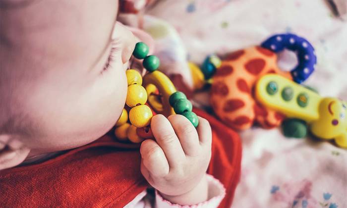 Baby and toy - First 1000 days of life