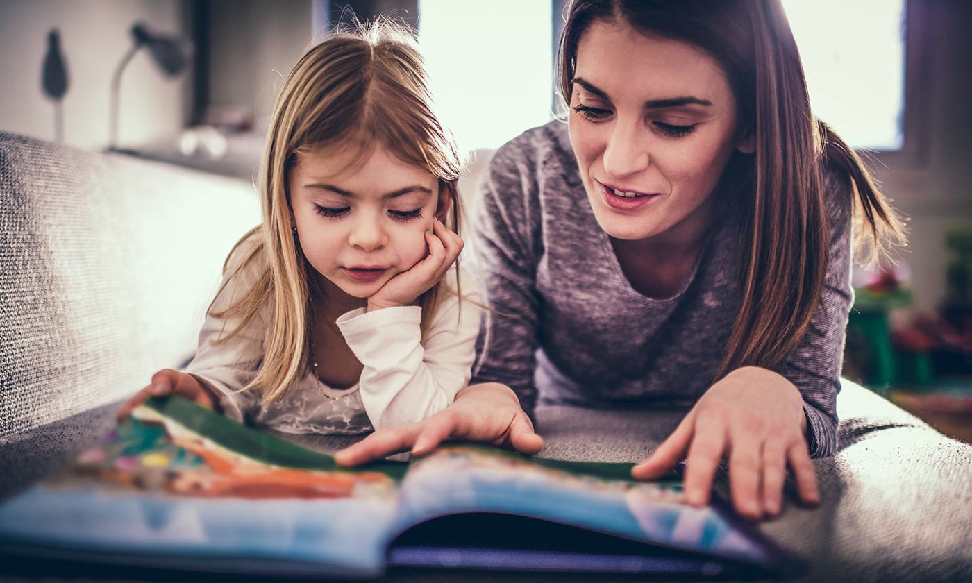 Mother and daughter reading