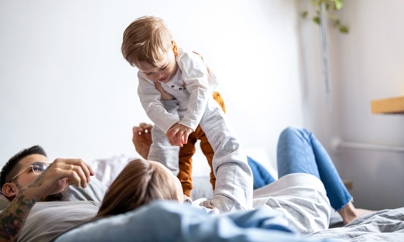 Young family having fun together at home