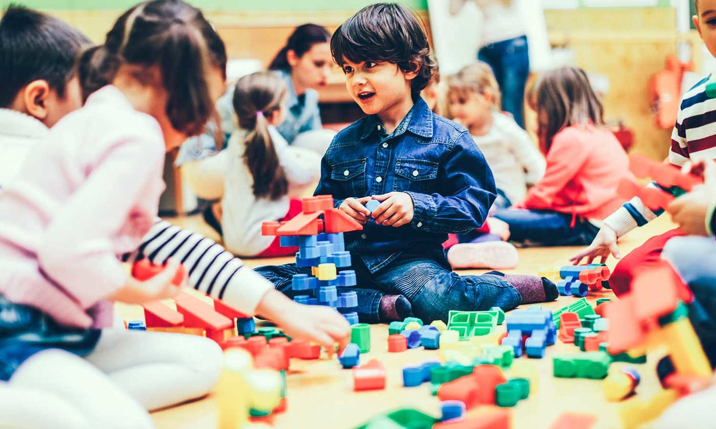 Group of children playing with blocks