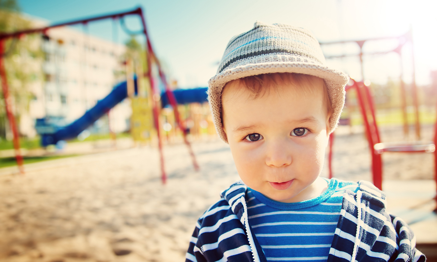 Little boy playing on playground