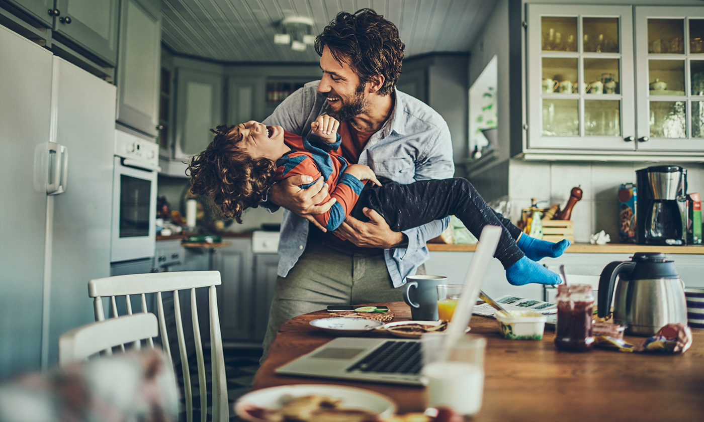 Father and son playing