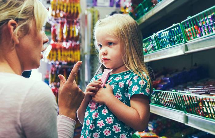 Discipline: Girl being disciplined by mother