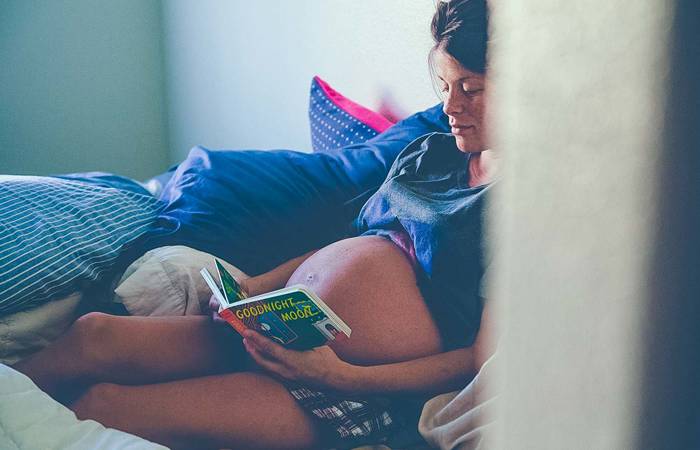 Pregnant mother reading